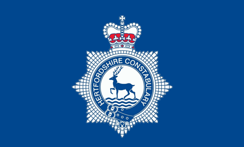 [Variant Hertfordshire Police flag]