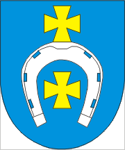 [Łapy coat of arms]