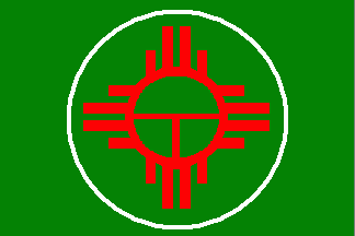 [red sun symbol on green field in white ring]