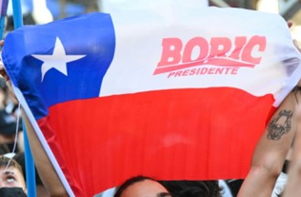 [Photograph of campaign flags at rally]