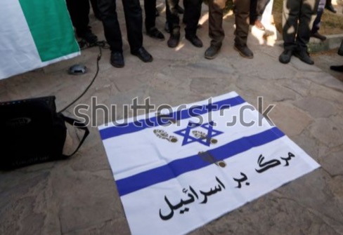 [anti-Israel flag]