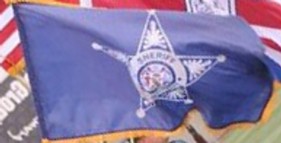 [Sheriff's Office flag]